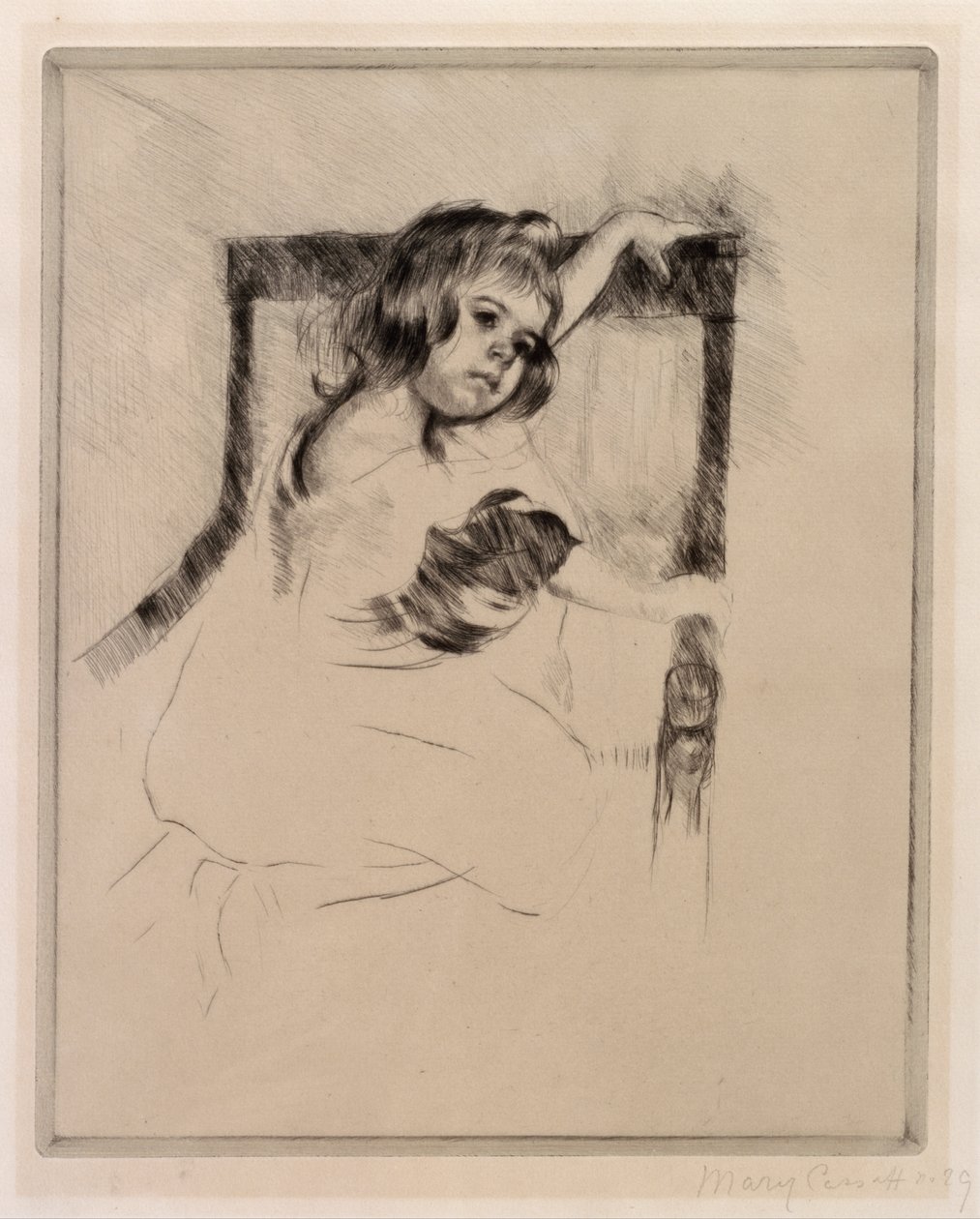 Polvillaan nojatuolissa tekijältä Mary Cassatt