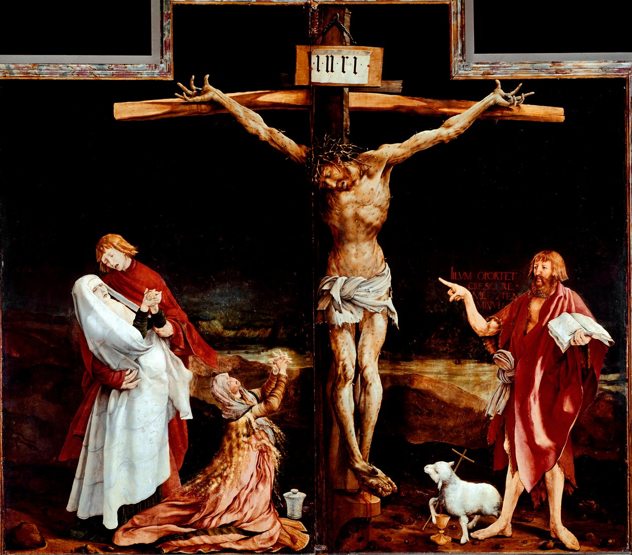 Issenheim-alttaritaulu (tai Isenheim): ristiinnaulitsemista esittävä keskustaulu - Kirjoitus "INRI"" ristissä - Mathis Neithardtin puumaalaus Gothardt dit Matthias Grunewald (n. 1480-1528) 1512-1516 Koko 269x307 cm Unterlinden, Musee tekijältä Matthias (c.1480 1528) Grunewald