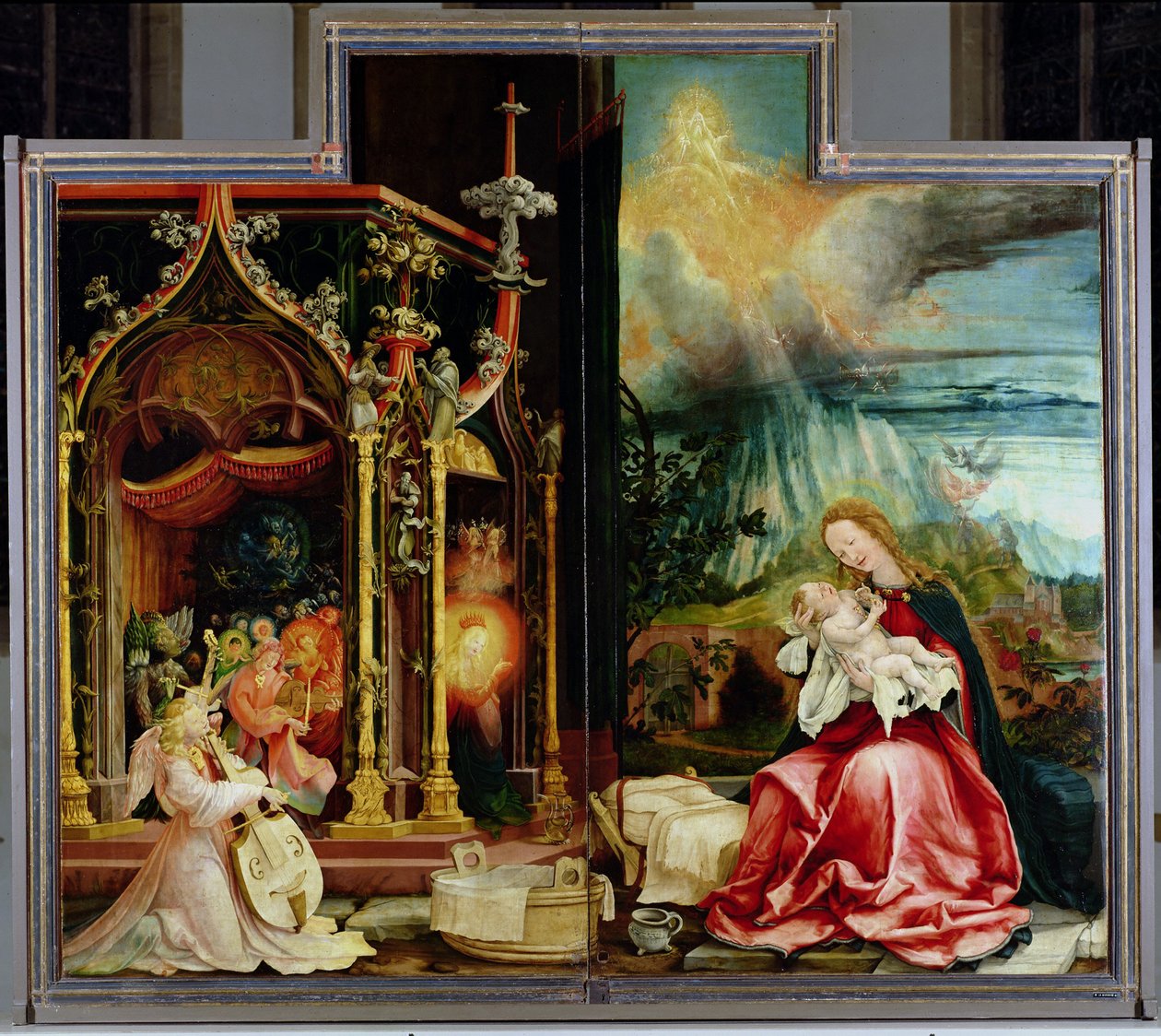 Isenheimin alttaritaulu. Keskuspaneeli: Enkelien ja syntymän konsertti, 1506-1515 tekijältä Matthias Grünewald