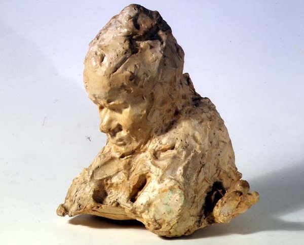 Miehen pää (vaha kipsillä) tekijältä Medardo Rosso