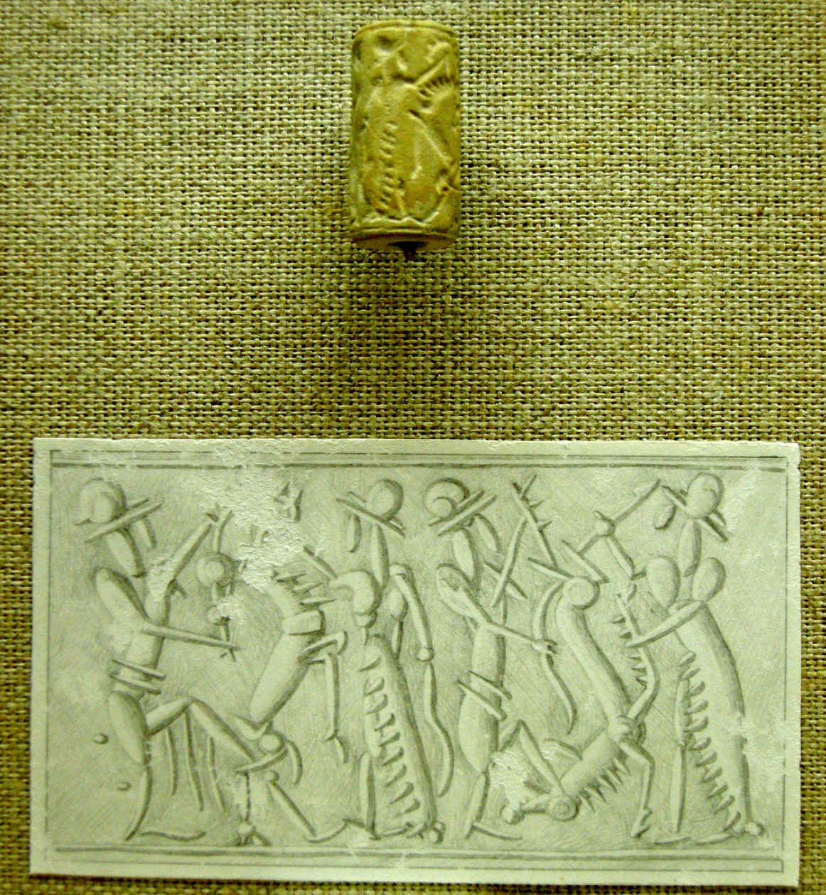 Sylinterin tiiviste painalluksella (fajanssi) tekijältä Mesopotamian