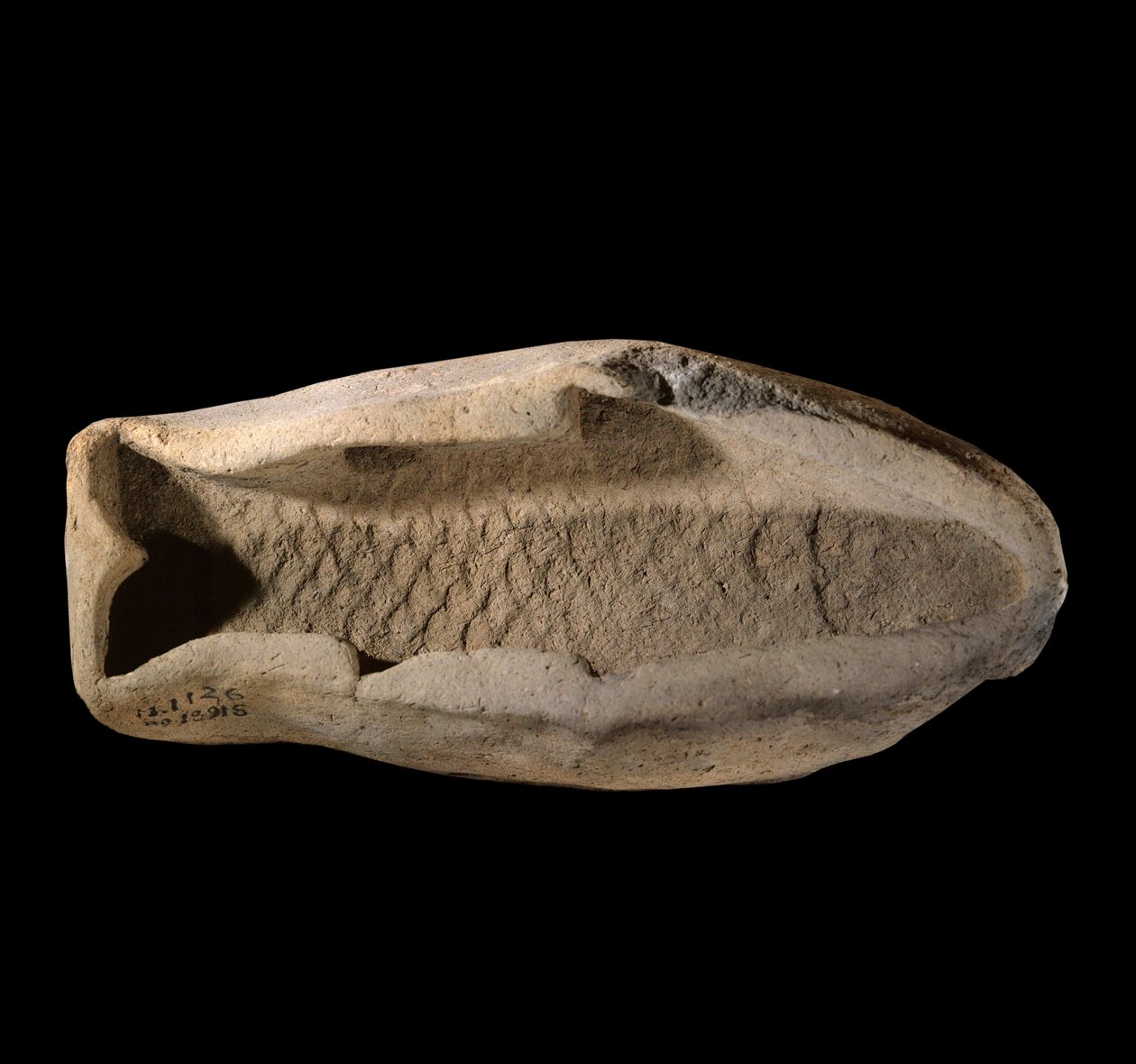 Mesopotamia: kalan muotoinen terrakottamuotti. Noin 1800 eaa. Marin kuningas Zimri Limin palatsin kuninkaallisista ruoista. Pariisi, Louvre-museo tekijältä Mesopotamian