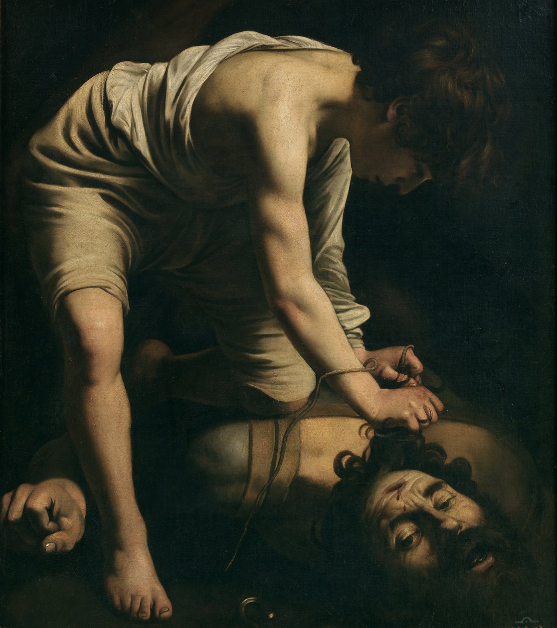 Daavid Goljatin pään kanssa tekijältä Michelangelo Merisi Caravaggio