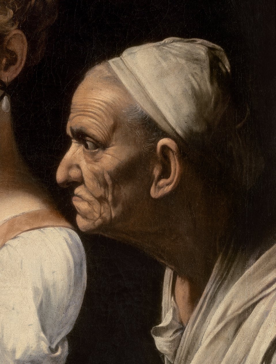 Yksityiskohta palvelijasta Judith ja Holofernes, 1599 tekijältä Michelangelo Merisi Caravaggio