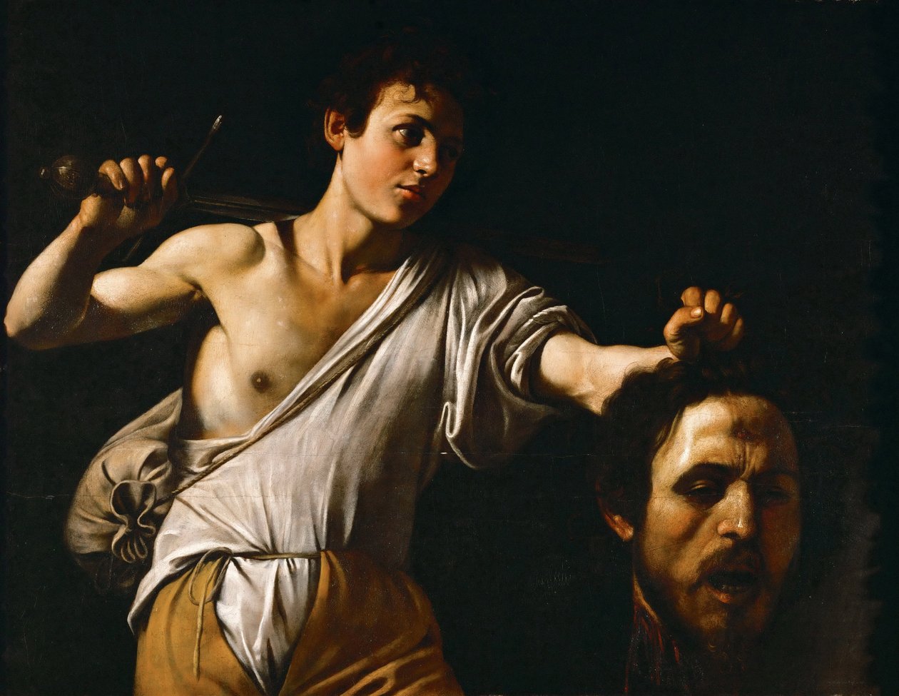 Barokki: David avec la tete de Goliath - David Goljatin pään kanssa par Caravaggio, Michelangelo (1571-1610), n. 1600. Öljy puulle, 90,5x116. Taidehistoriallinen museo, Vienne tekijältä Michelangelo Merisi da Caravaggio