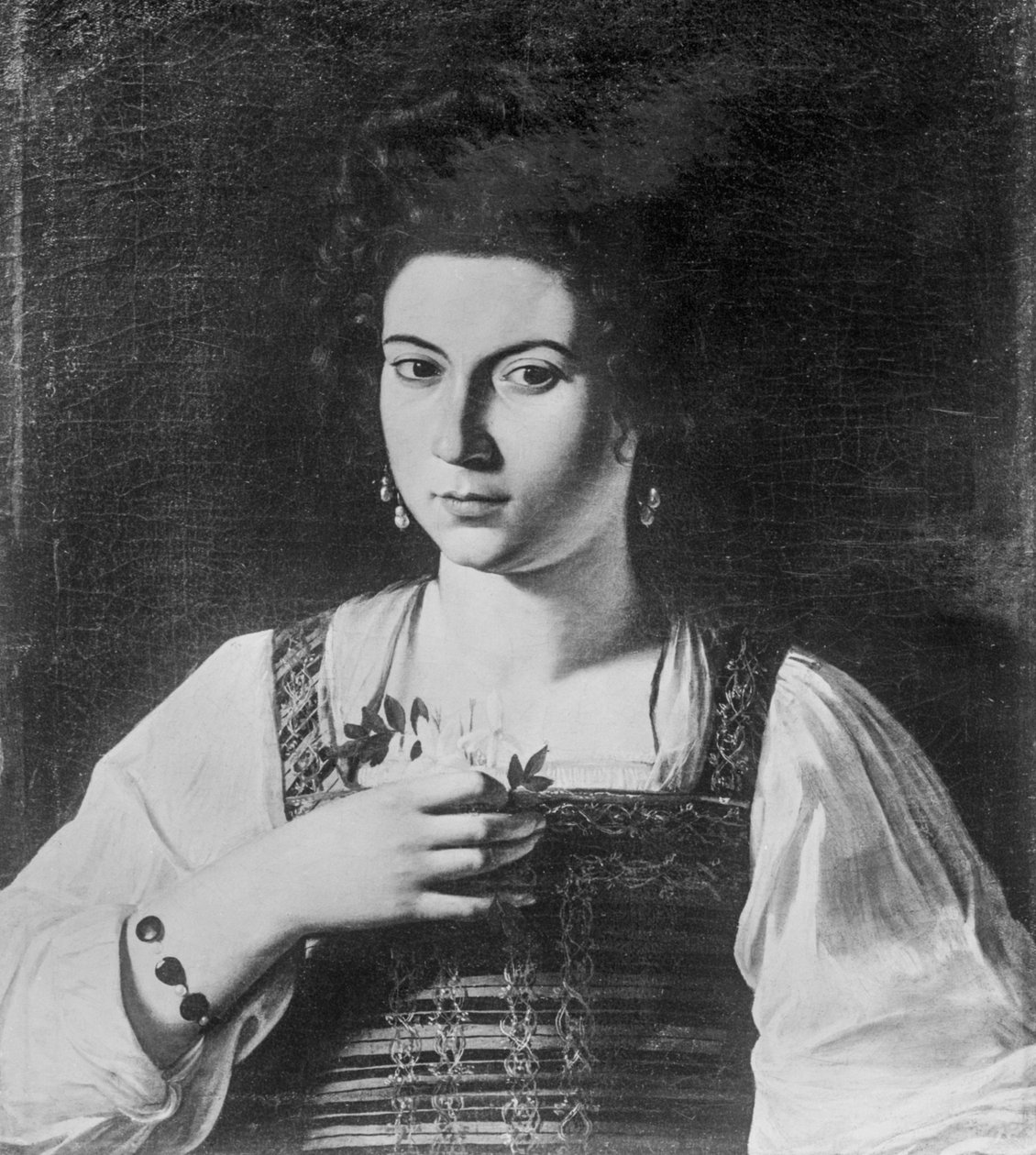 Kurtisaanin muotokuva (tunnetaan myös nimellä Portrait of Fillide) (tuhoutunut taideteos), n. 1590 (öljy kankaalle) tekijältä Michelangelo Merisi da Caravaggio