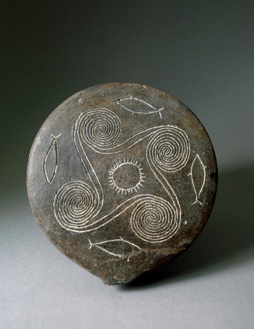 Minolainen taide: Naxoksen pyöreä levy terrakottassa. Minolainen sivilisaatio. 2400-2000 eaa. Athenes, kansallinen arkeologinen museo tekijältä Minoan