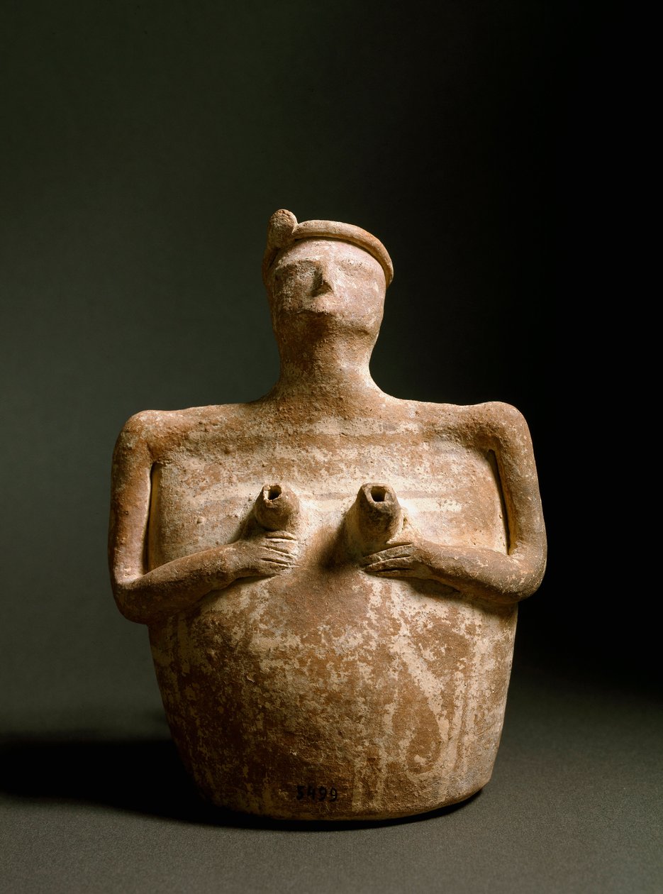 Minolainen taide: terrakottamaljakko naisen muotoinen, joka tukee rintaansa. Piskokephalon pyhäköstä Kreetalta. 1700-1450 eaa. Heraklion, arkeologinen museo tekijältä Minoan