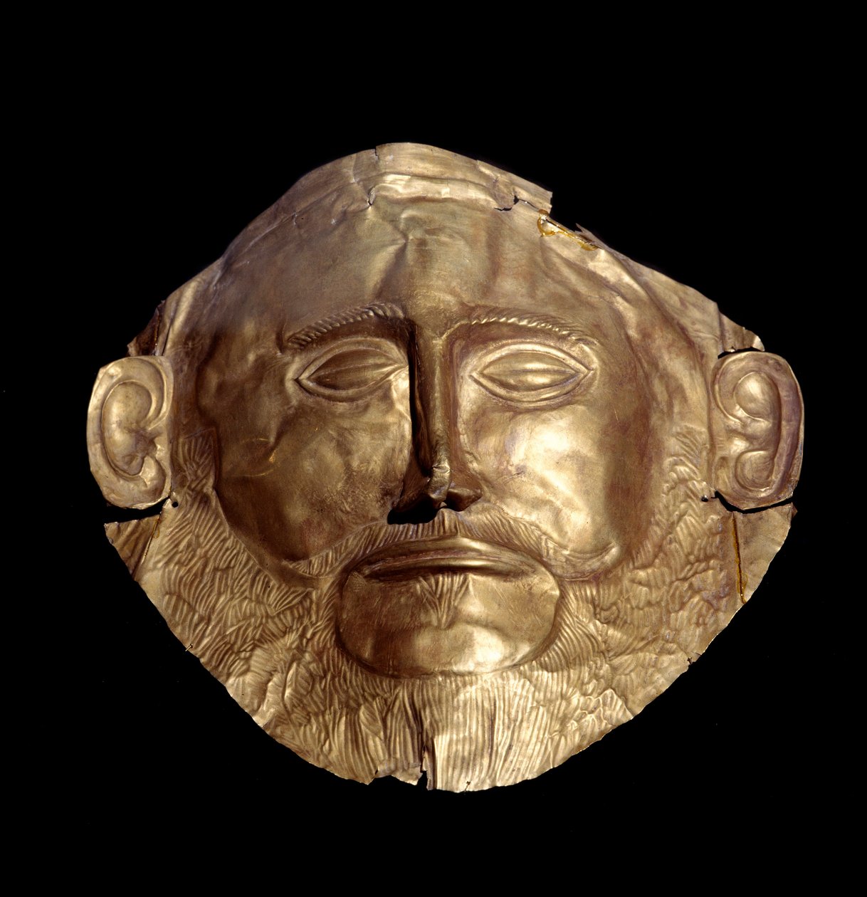 Hautausnaamio mykeneen kullasta (Mykeneen), joka tunnetaan nimellä "Agamemnonin naamio"" tekijältä Mycenaean