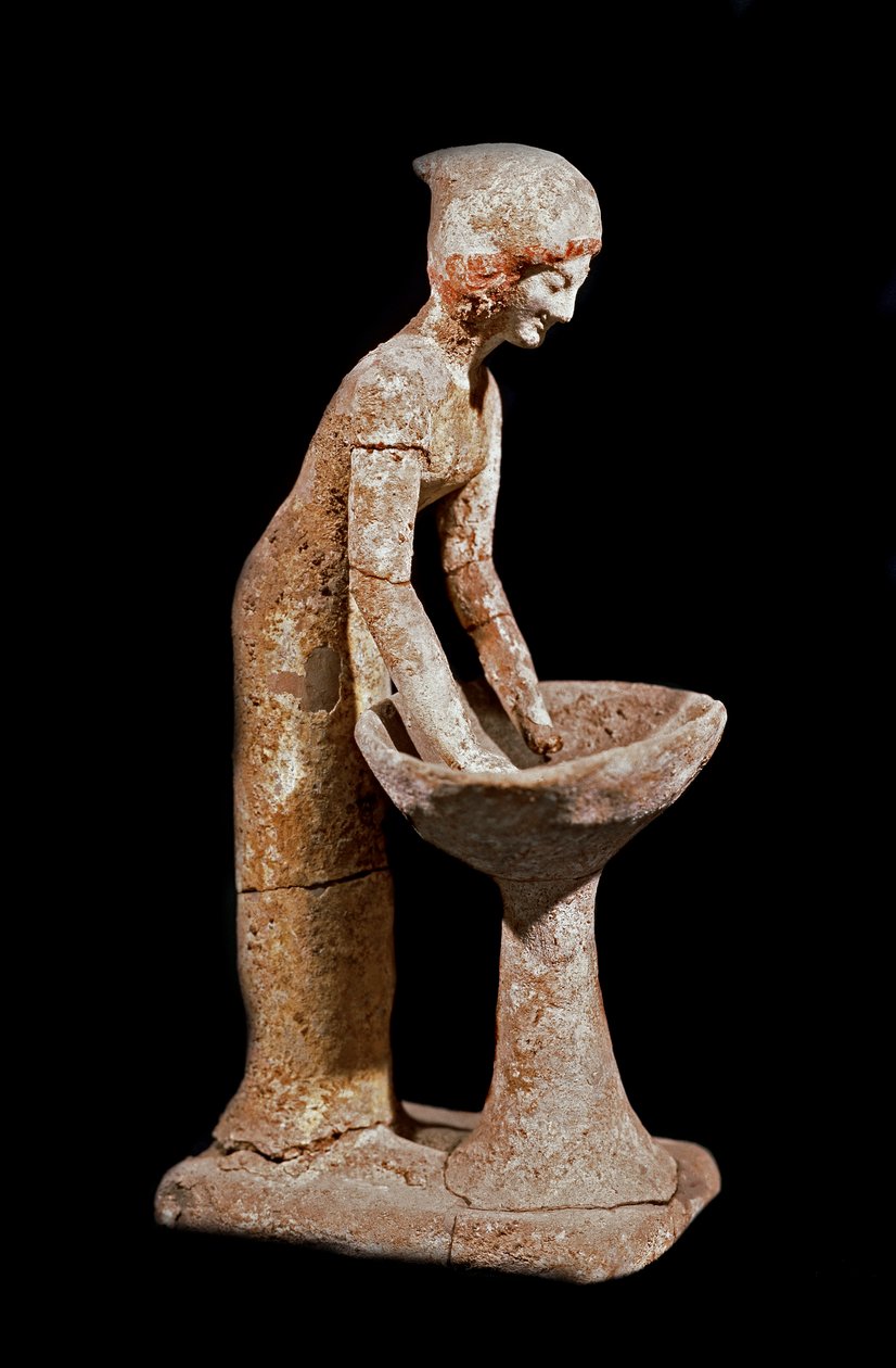 Mykeneen taide: jauhoja kurkistava naisen hahmo. 1500-luvulla eaa. Strasbourg, arkeologinen museo tekijältä Mycenaean