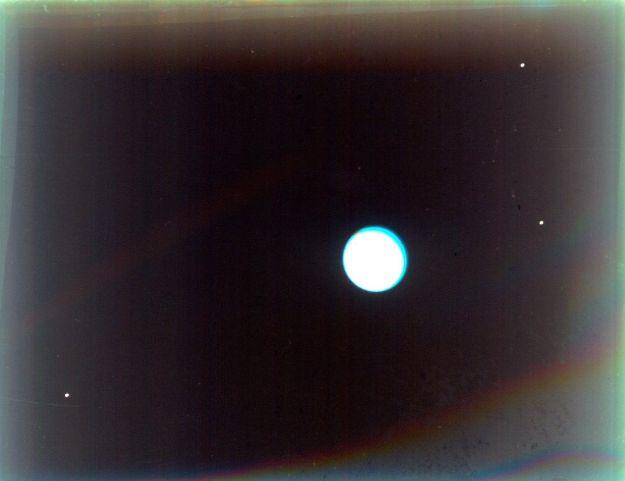 Uranus satelliittien Miranda, Ariel ja Umbriel kanssa, Voyager 2:sta, 24. tammikuuta 1986. tekijältä NASA Images
