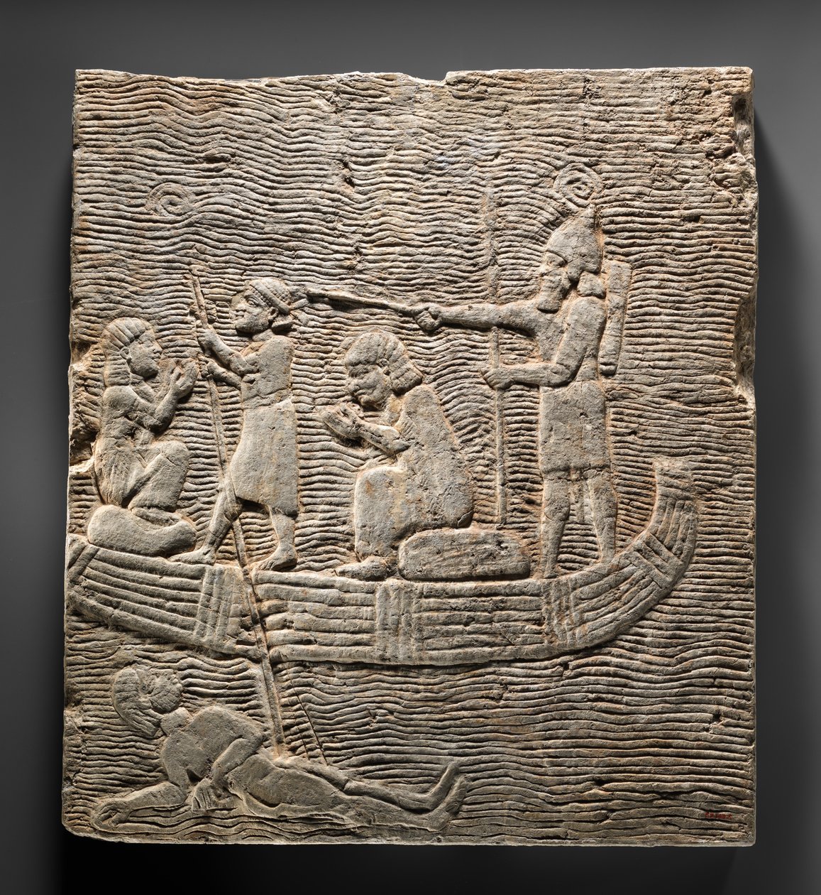 Helpotusta: Assyrialainen sotilas johdattaa vankeja veden yli, noin 668-627 eKr. (kipsialabasteri). tekijältä Neo Assyrian