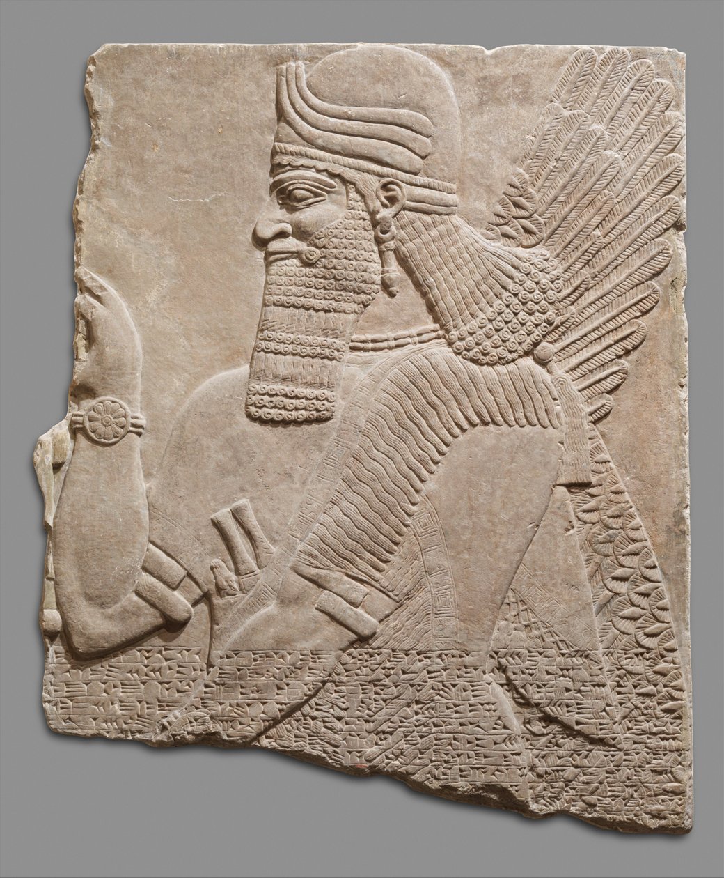 Yliluonnollista hahmoa esittävä reliefitaulu, noin 883-59 eKr. (kipsialabasteri). tekijältä Neo Assyrian