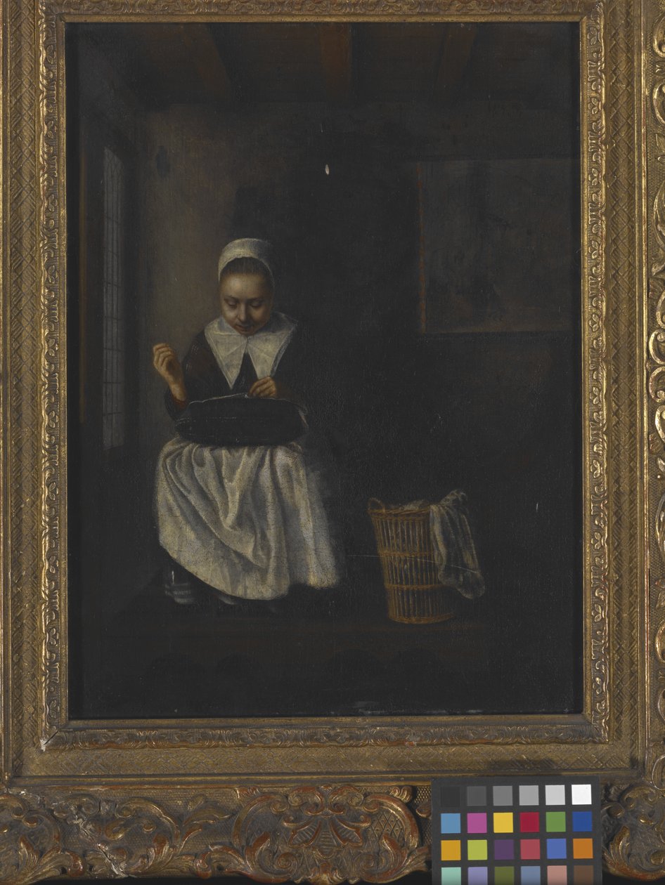 Tyttö ompelu (öljy puulle) tekijältä Nicolaes Maes