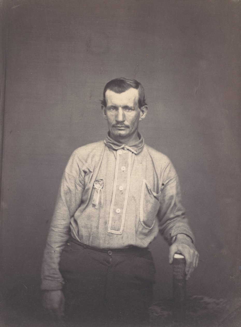 Mies, jolla on patenttiviraston kirja, n. 1857. tekijältä Oliver H. Willard.