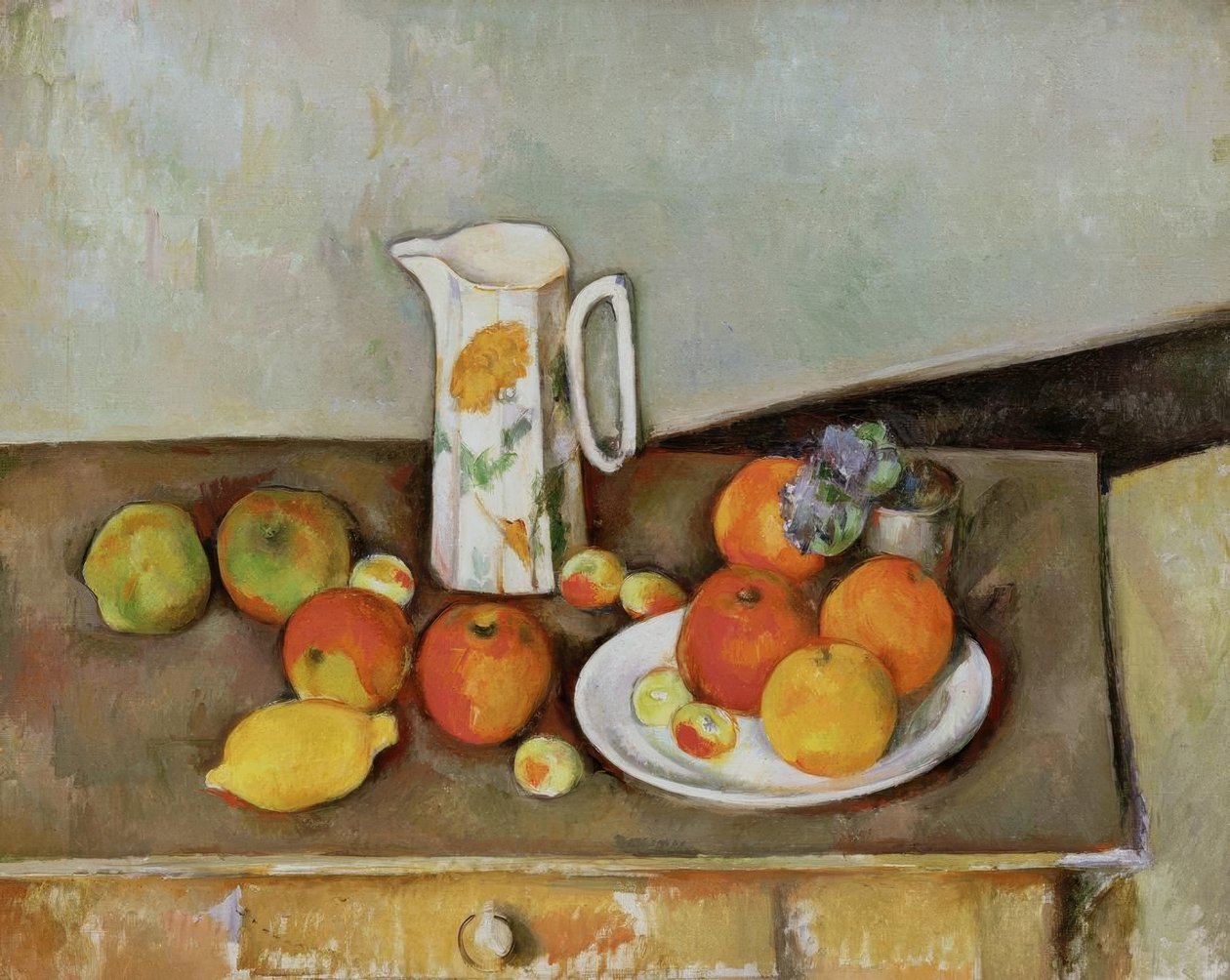 Asetelma: maitokannu ja hedelmiä pöydällä tekijältä Paul Cézanne