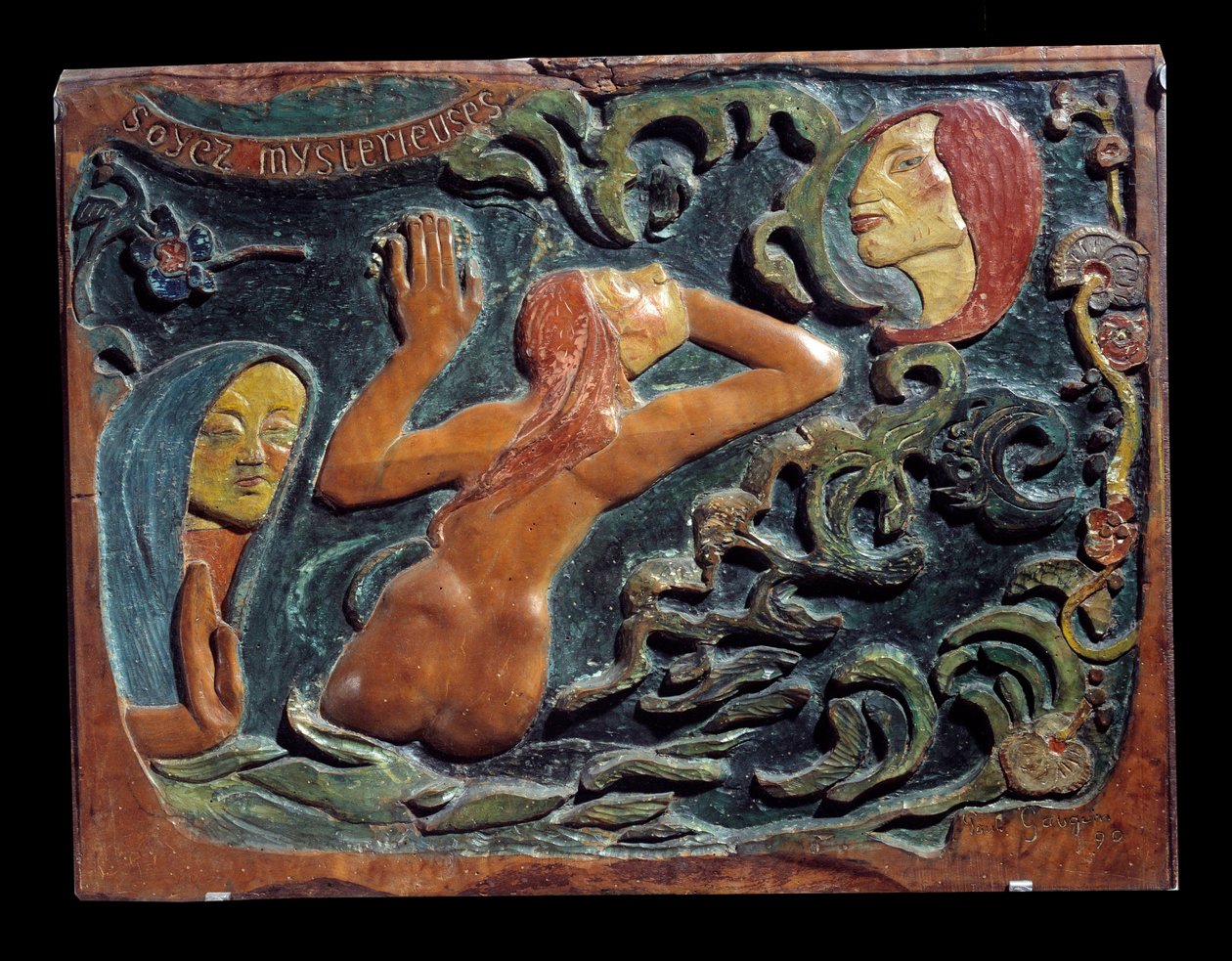 Paul Gauguinin (1848-1903) lehmuspuuhun kaiverrettu Ole mystinen helpotus tekijältä Paul Gauguin