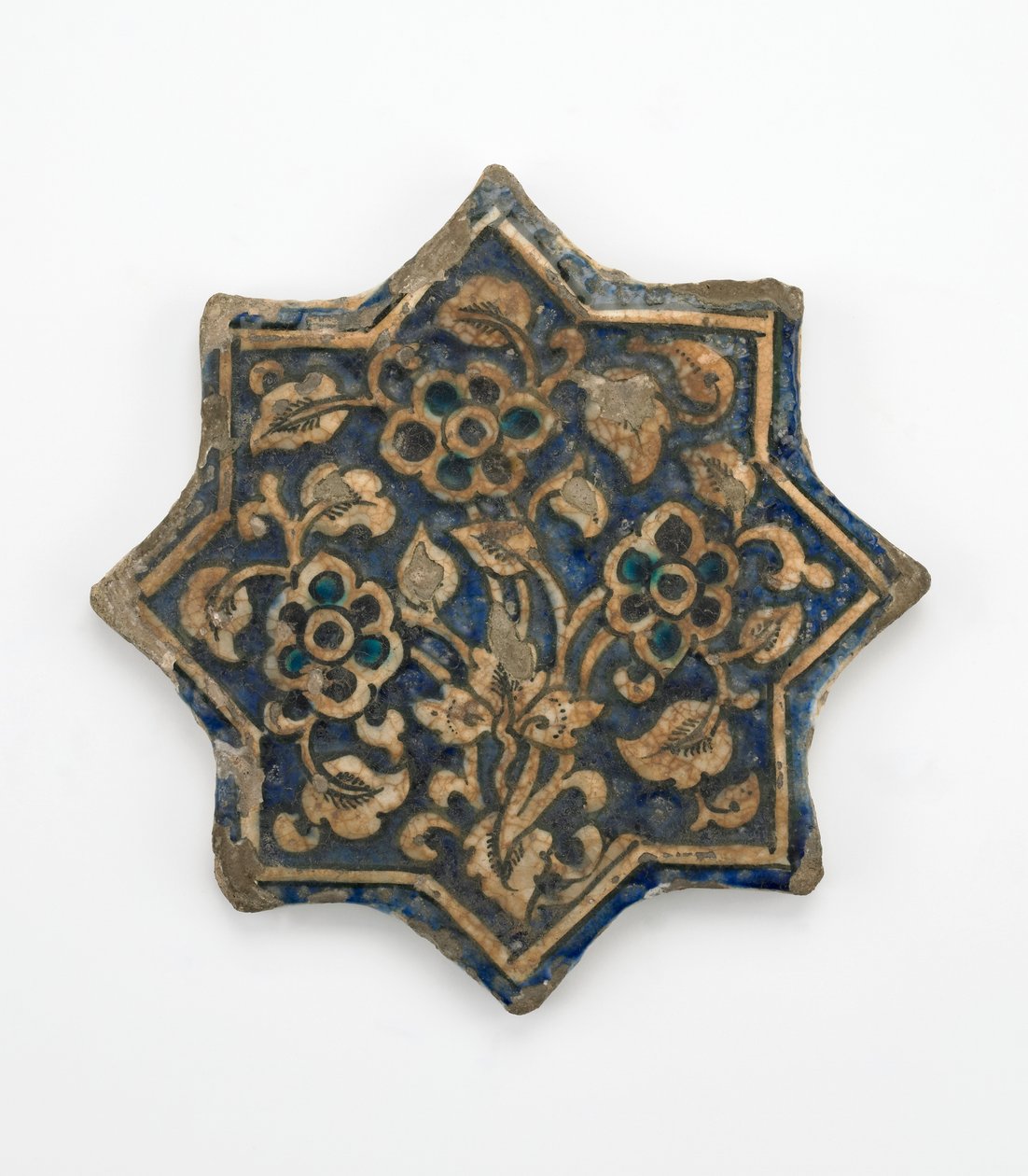 Laatta kahdeksansakaraisen tähden muodossa, Il-Khanid-kausi, 1256-1335 (kivitahna, valettu ja maalattu läpinäkyvän lasitteen alla) tekijältä Persian School