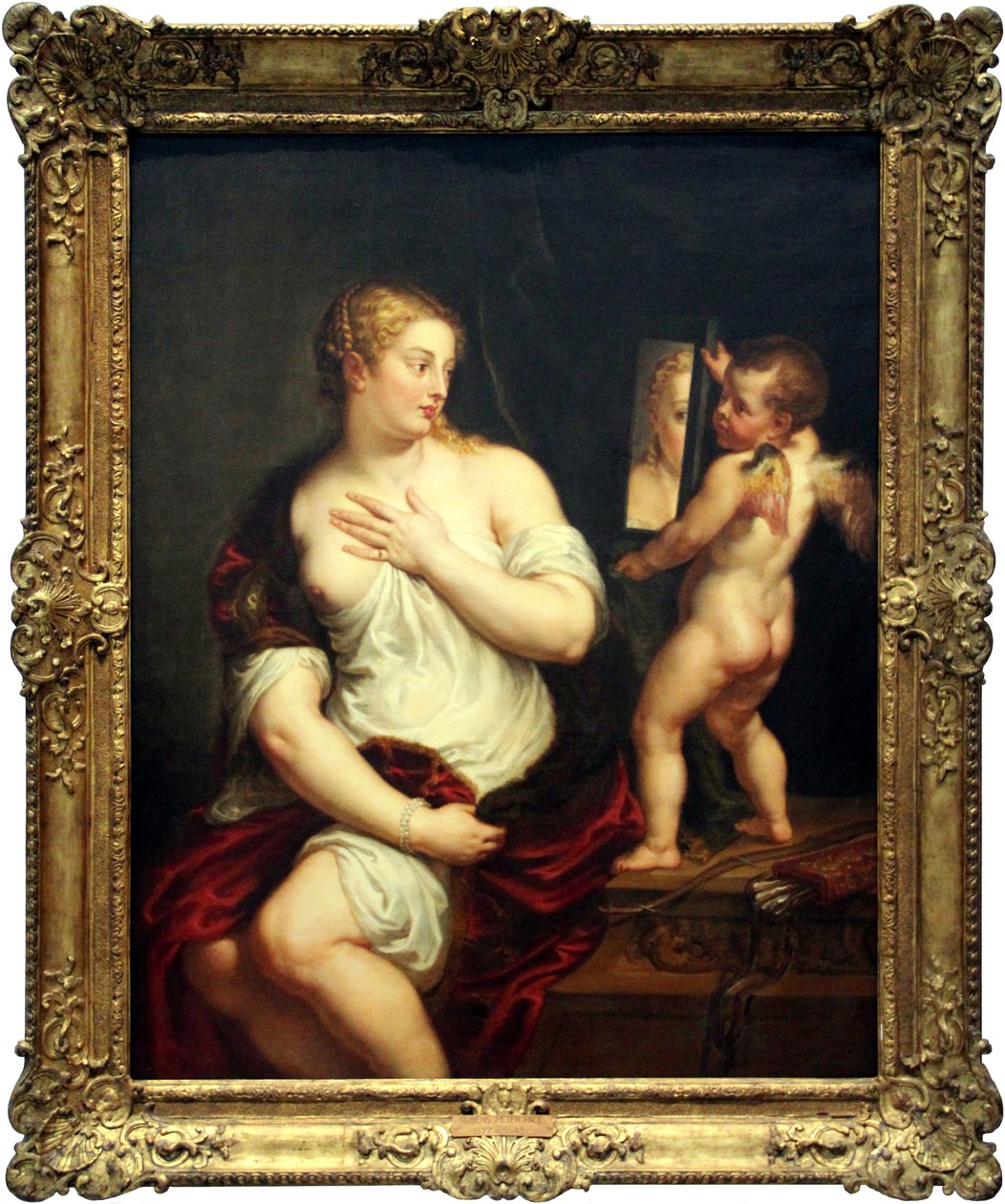 Venus ja Amor pitävät peiliä tekijältä Peter Paul Rubens