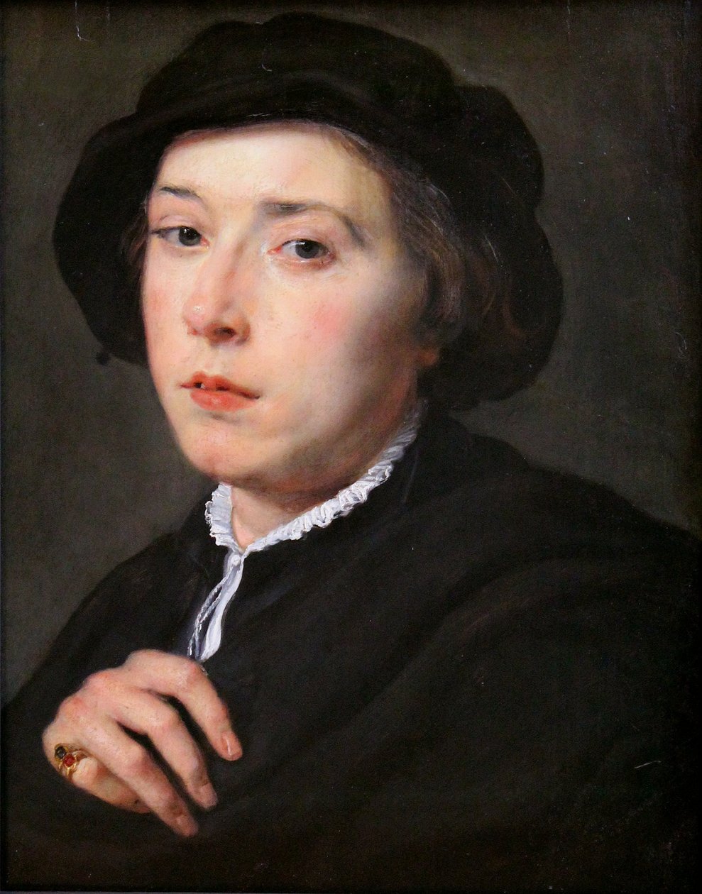 Nuori mies mustassa hatussa tekijältä Peter Paul Rubens