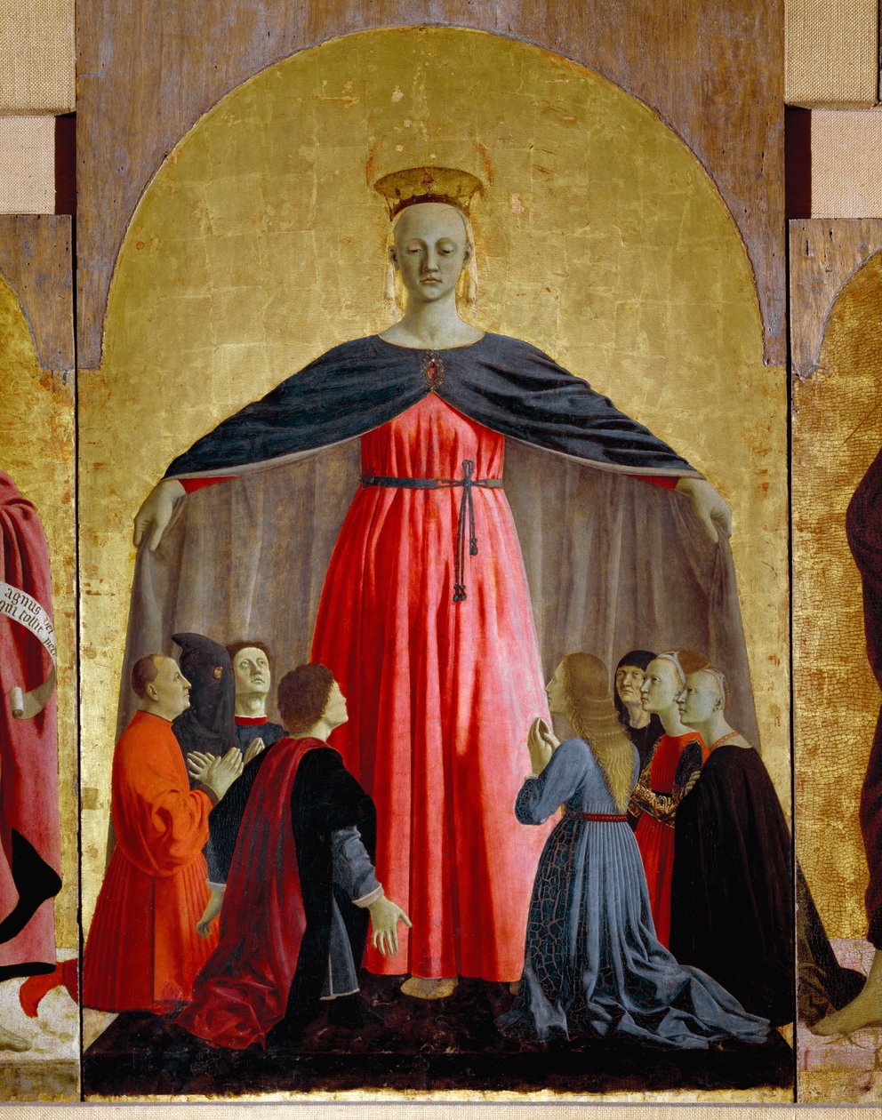 Misericorden polyptiikka: Misericorden neitsyt, pyhien ympäröimänä. Neitsyt Mariaa kuvaava yksityiskohta. Piero della Francescan maalaus puulle (1415/20-1492) 1445-1460 Dim. 134x91 cm Sansepolcro, Pinacoteca Comunale tekijältä Piero della Francesca