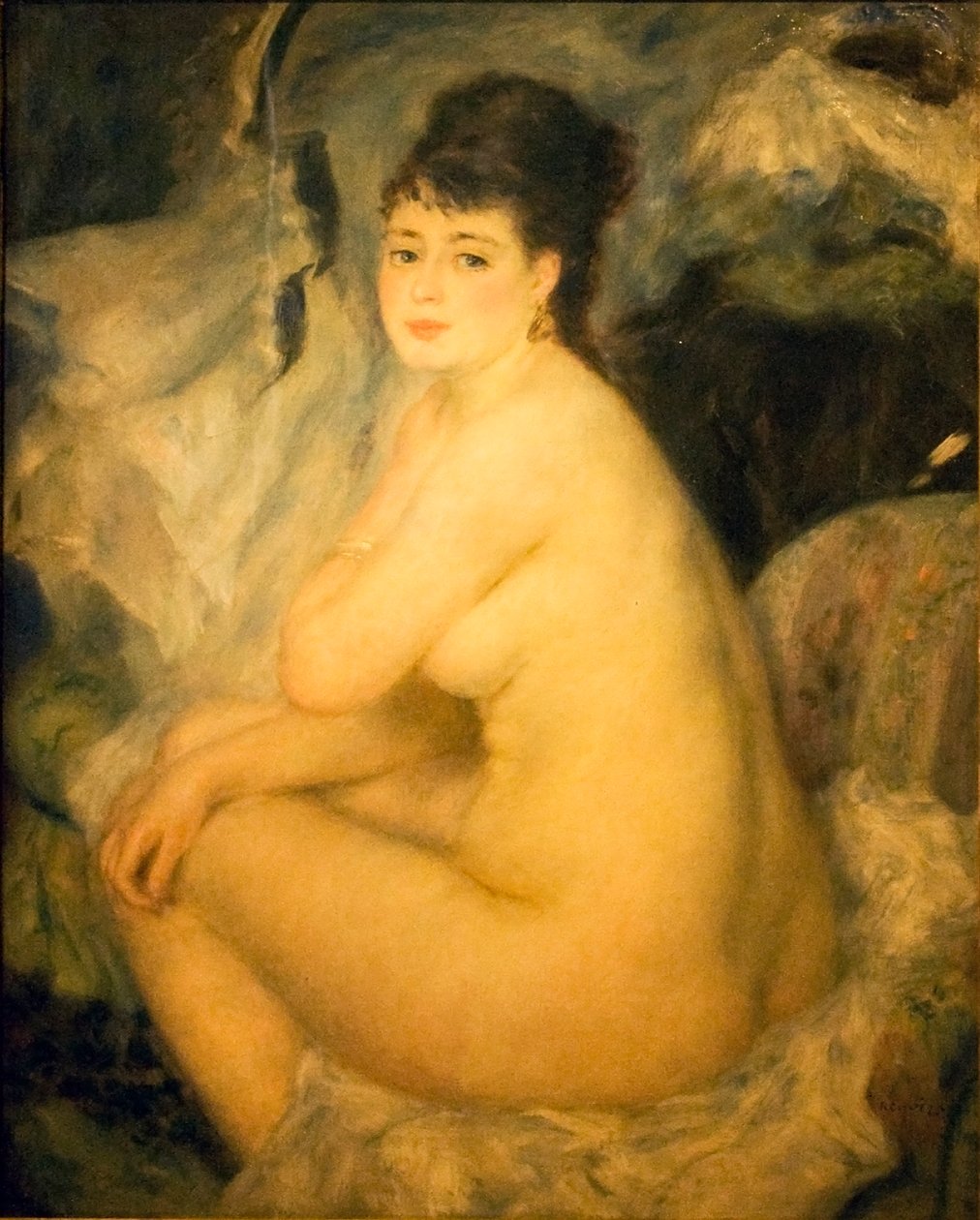 Alaston nainen istuu sohvalla Annan tekijältä Pierre Auguste Renoir