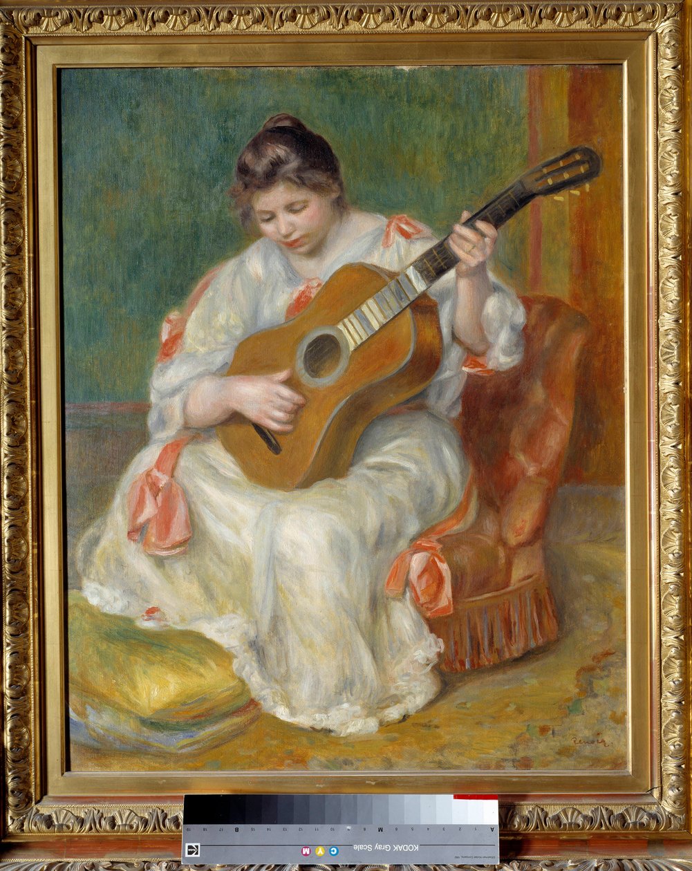 Nainen soittaa kitaraa. Pierre Auguste Renoirin (1841-1919) maalaus tekijältä Pierre Auguste Renoir