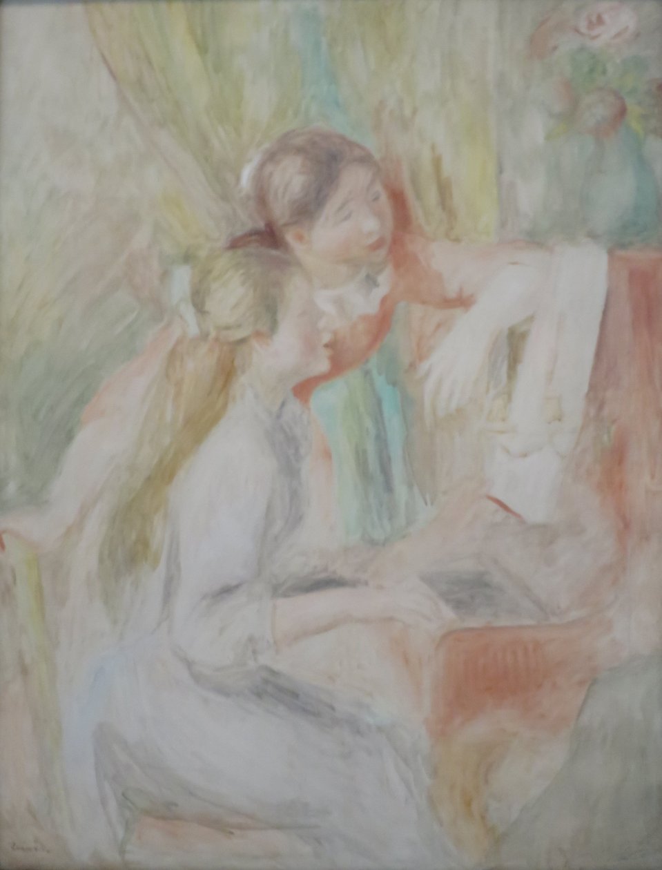 Nuoret tytöt pianon ääressä tekijältä Pierre Auguste Renoir