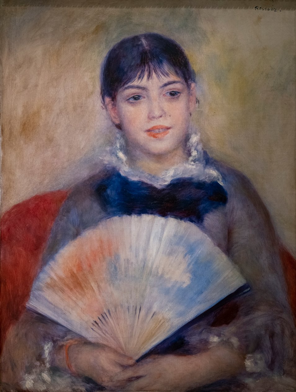Nuori nainen tuulettimen kanssa tekijältä Pierre Auguste Renoir