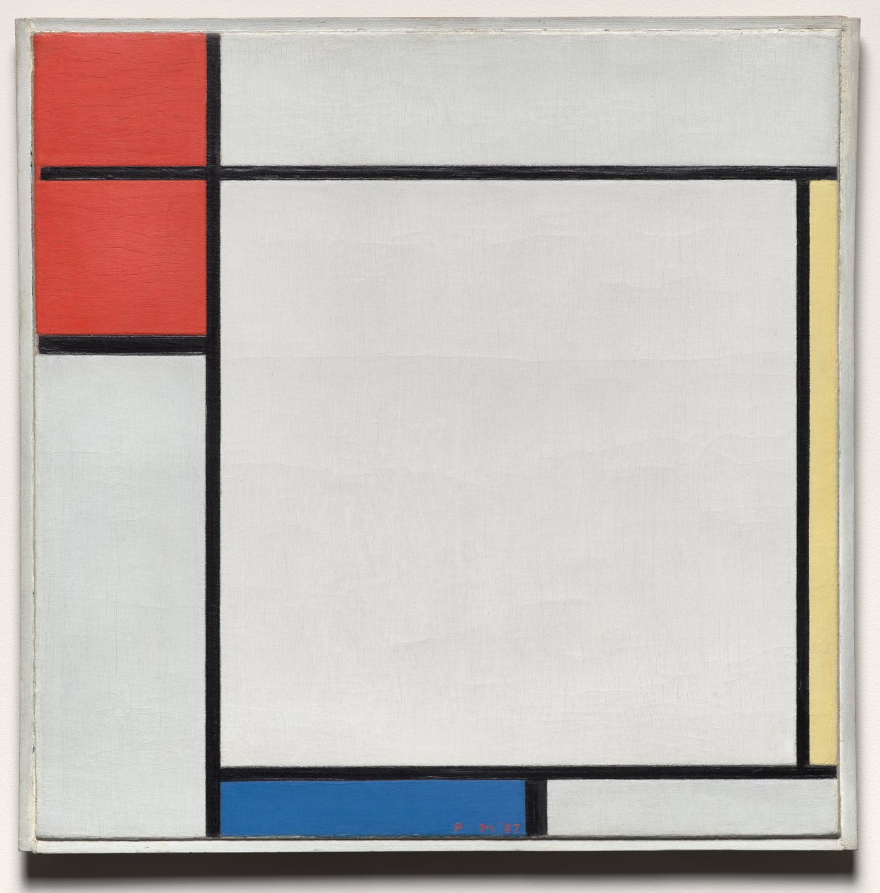Koostumus punaisella, keltaisella ja sinisellä tekijältä Piet Mondrian
