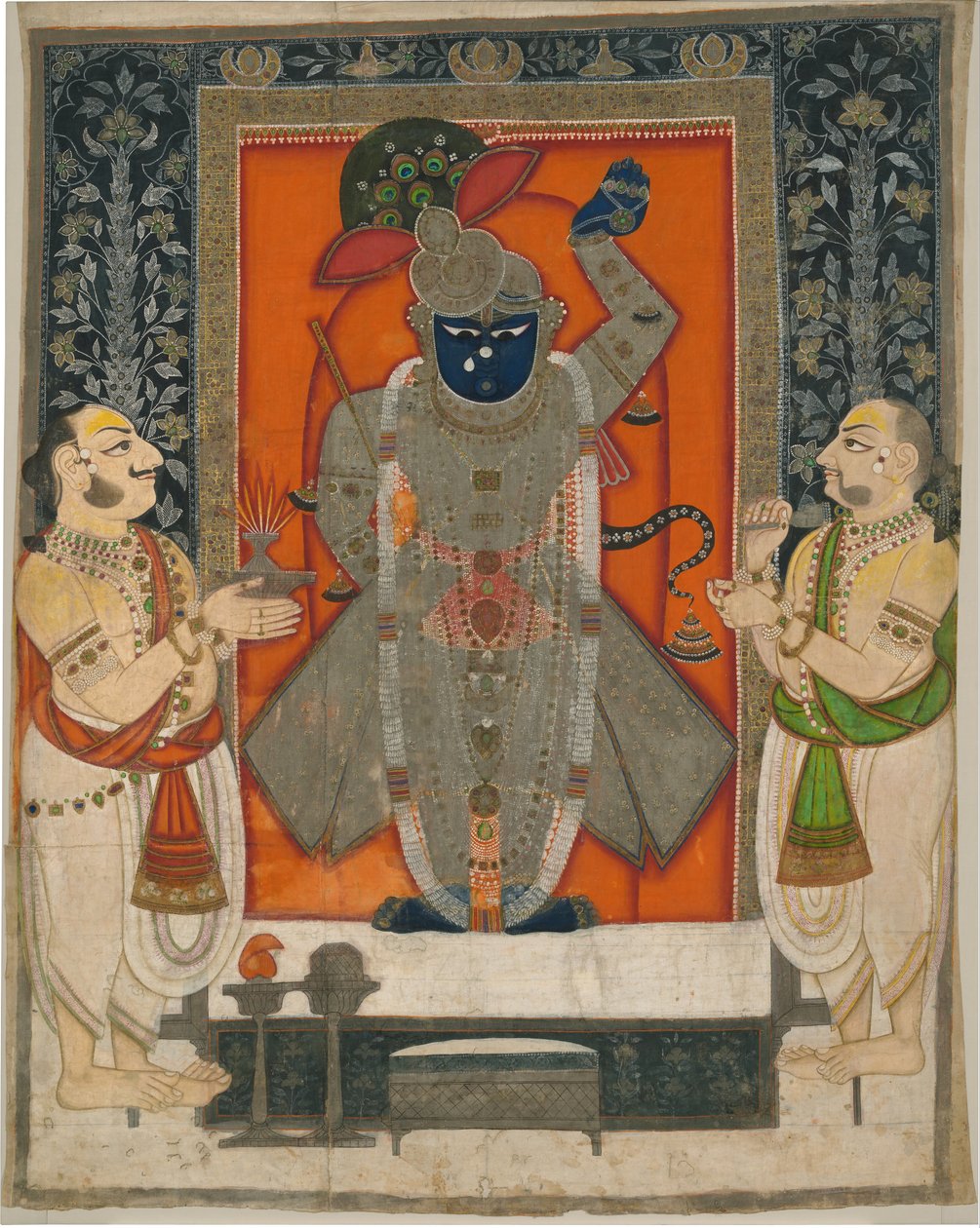 Papit, jotka palvovat Krishnaa Shrinathjina ruoanvuoren juhliin [Annakuta utsava]; pyhäkkö roikkuu [pichhavai] tekijältä Rajasthan Kota school