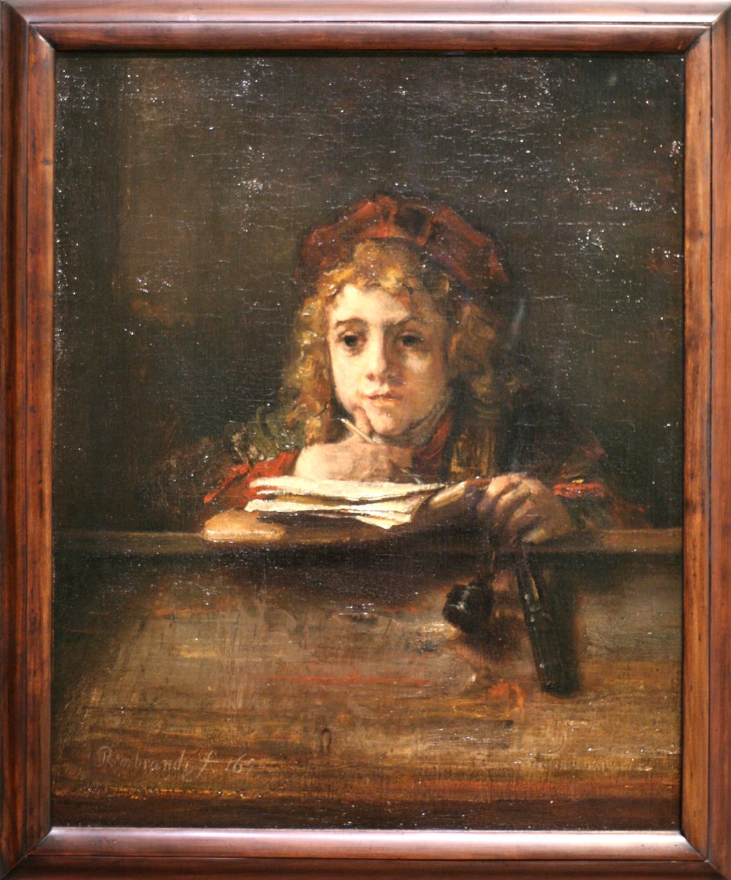 Titus työpöydällään tekijältä Rembrandt van Rijn