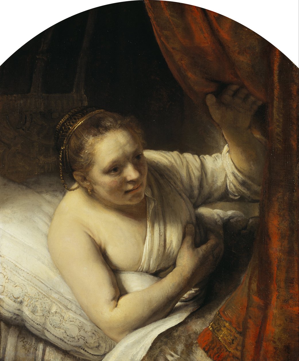 Nainen sängyssä tekijältä Rembrandt van Rijn