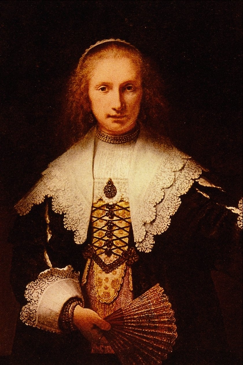 Nainen tuulettimen kanssa tekijältä Rembrandt van Rijn