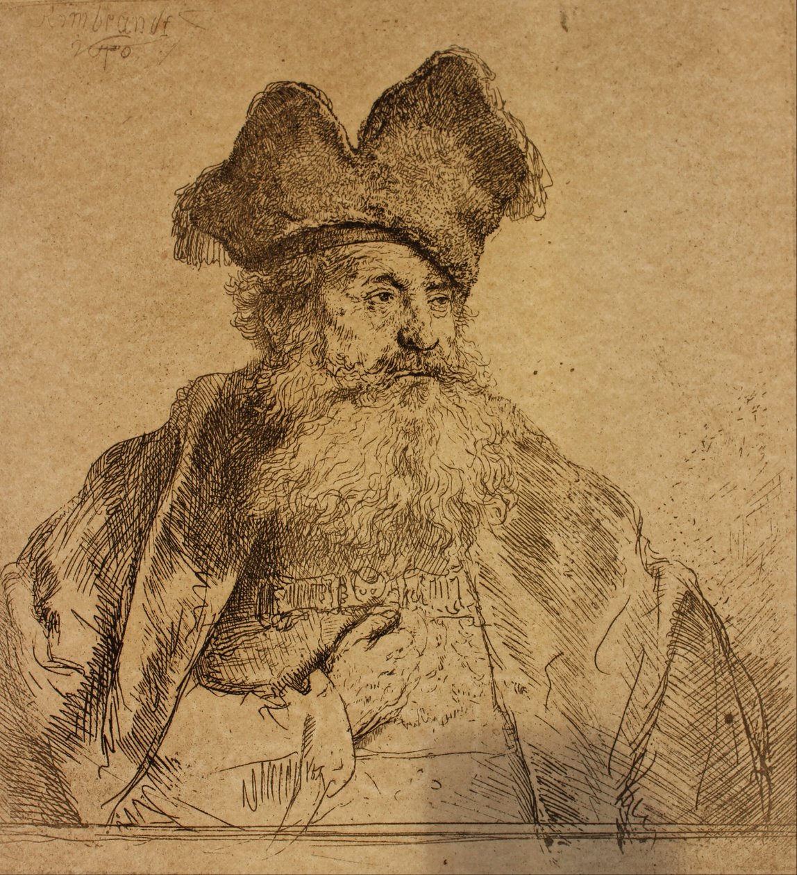 Vanha mies, jolla on jaettu turkislakki tekijältä Rembrandt van Rijn