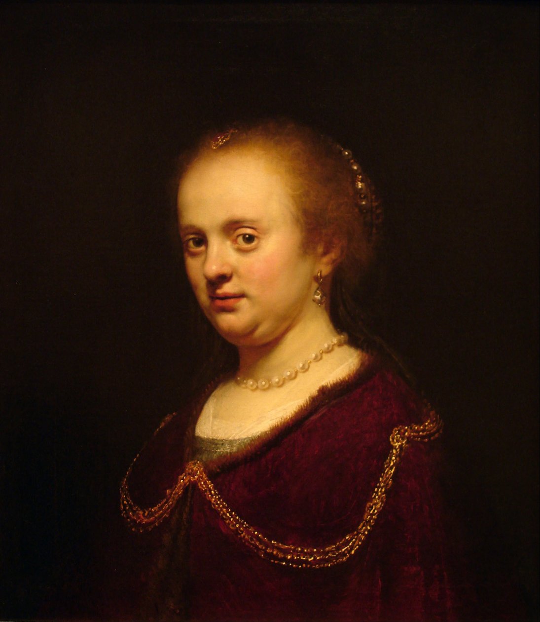 Nuoren naisen muotokuva tekijältä Rembrandt van Rijn