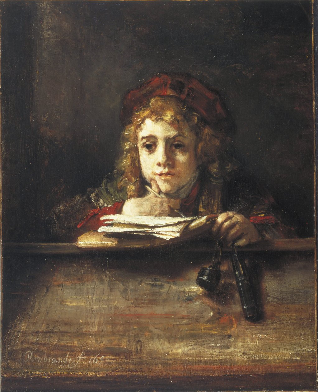 Titus työpöydällään tekijältä Rembrandt van Rijn