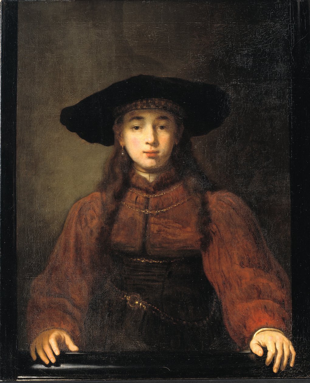 Nuori nainen lepäämässä kätensä kuvakehyksen päällä tekijältä Rembrandt van Rijn
