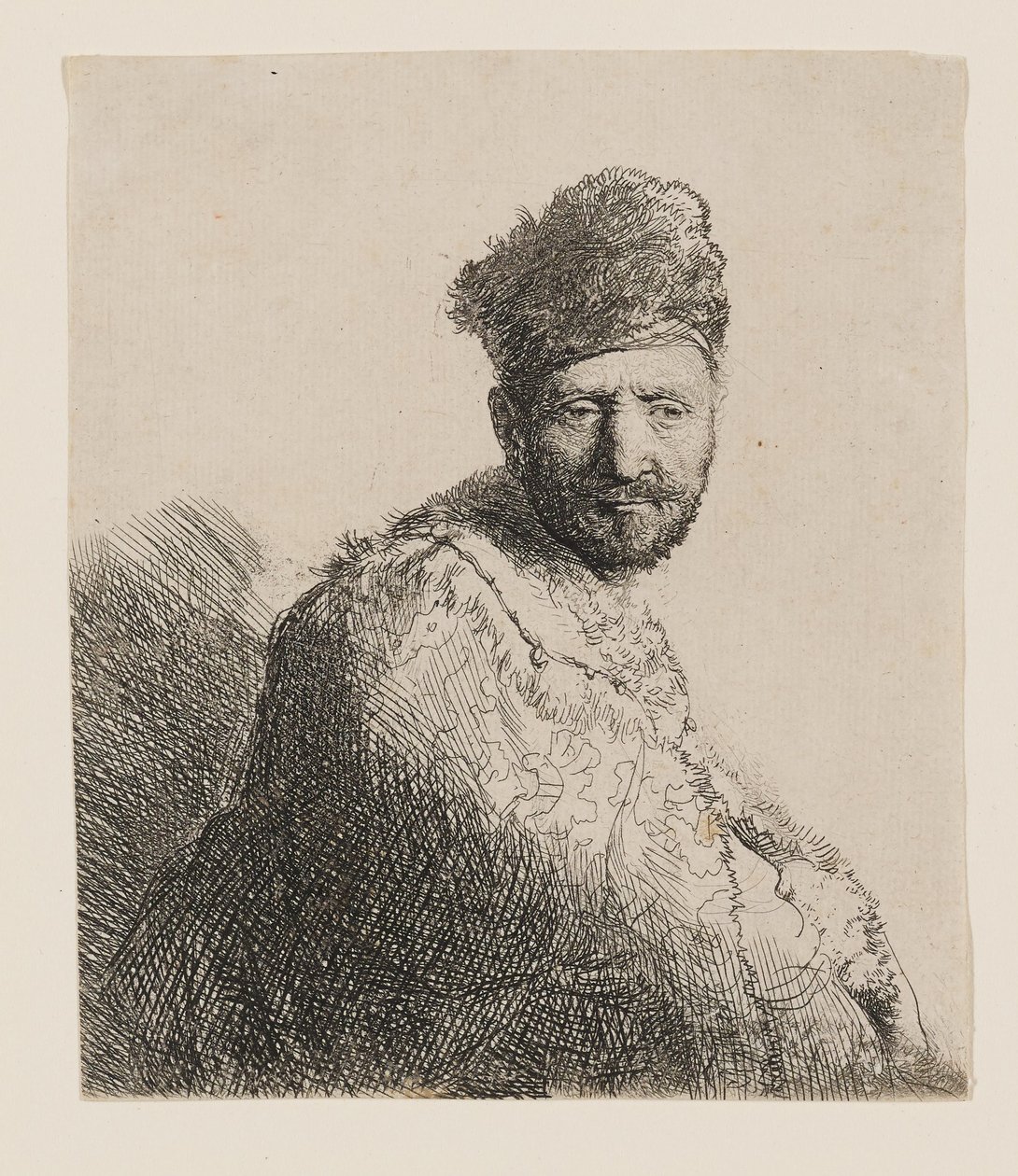 Parrakas mies, jolla on turkilla koristeltu itämainen hattu ja kaapu: puolihahmo tekijältä Rembrandt van Rijn