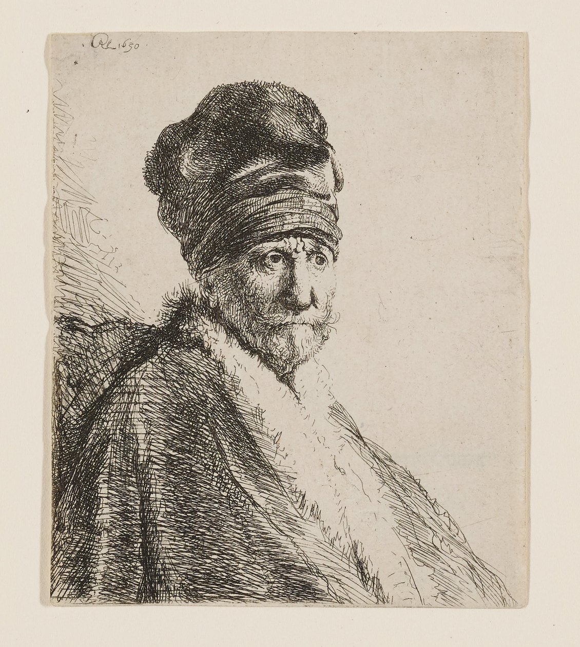 Miehen rintakuva, jolla on korkea lippalakki tekijältä Rembrandt van Rijn