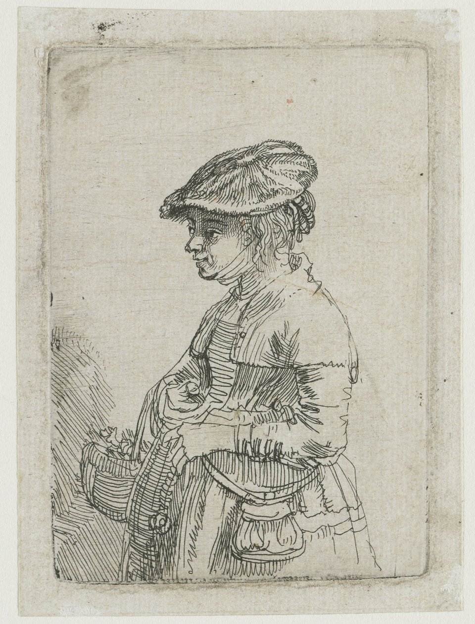 Tyttö korin kanssa tekijältä Rembrandt van Rijn