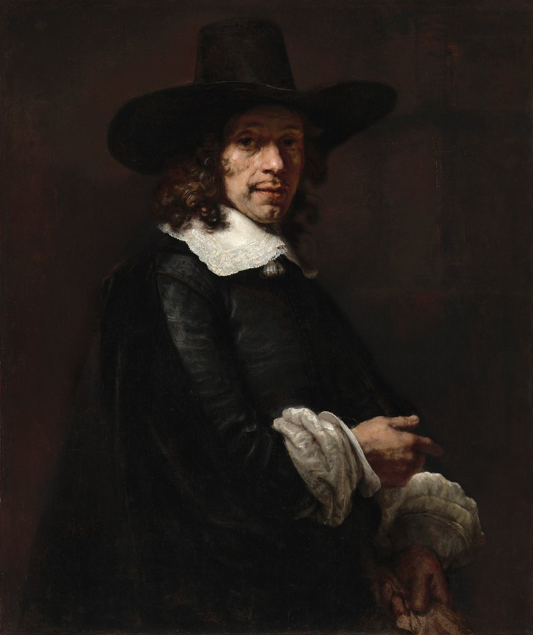 Muotokuva herrasmiehestä, jolla on pitkä hattu ja hanskat tekijältä Rembrandt van Rijn