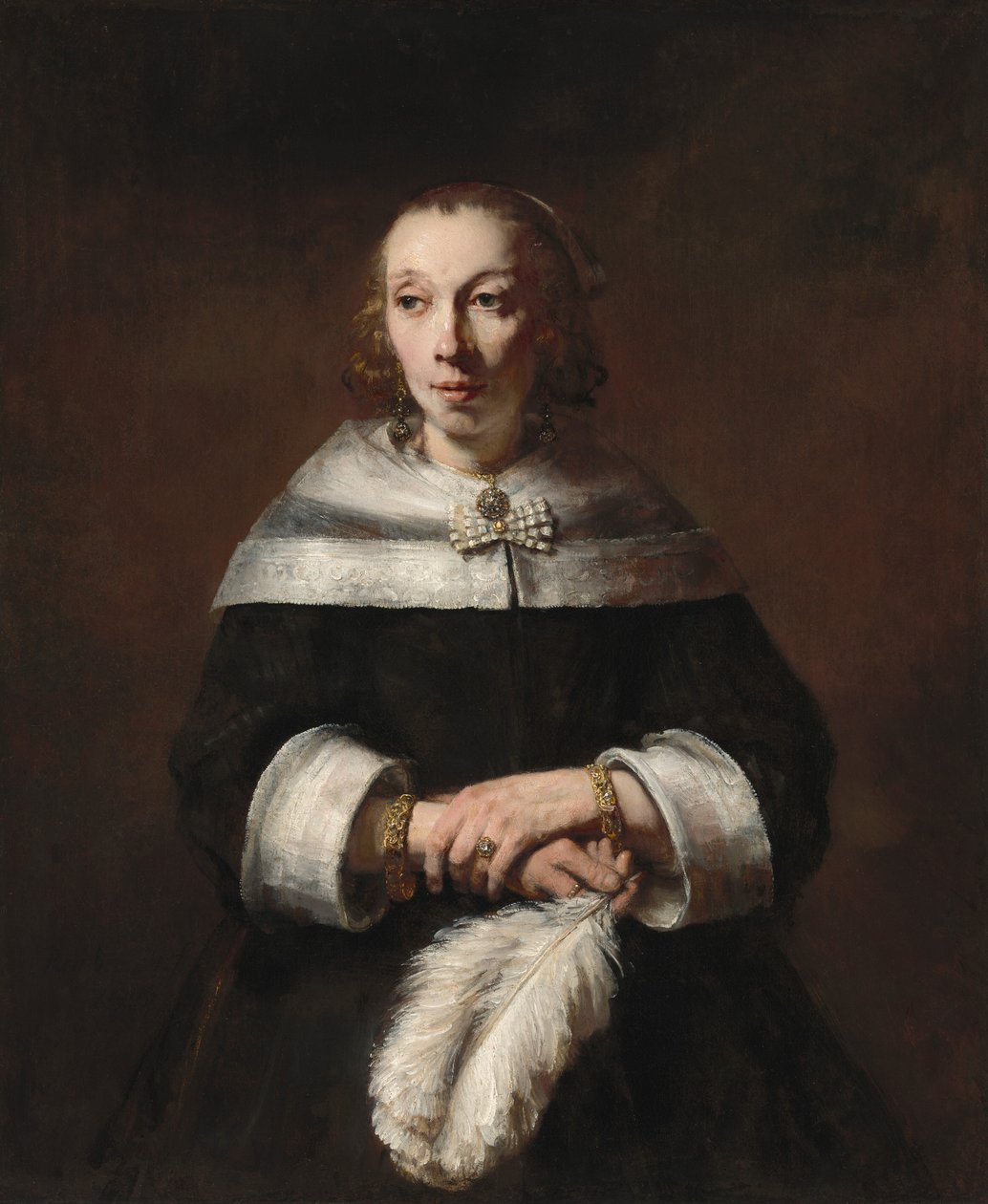 Naisen muotokuva strutsiviuhkan kanssa, n. 16561658. tekijältä Rembrandt van Rijn
