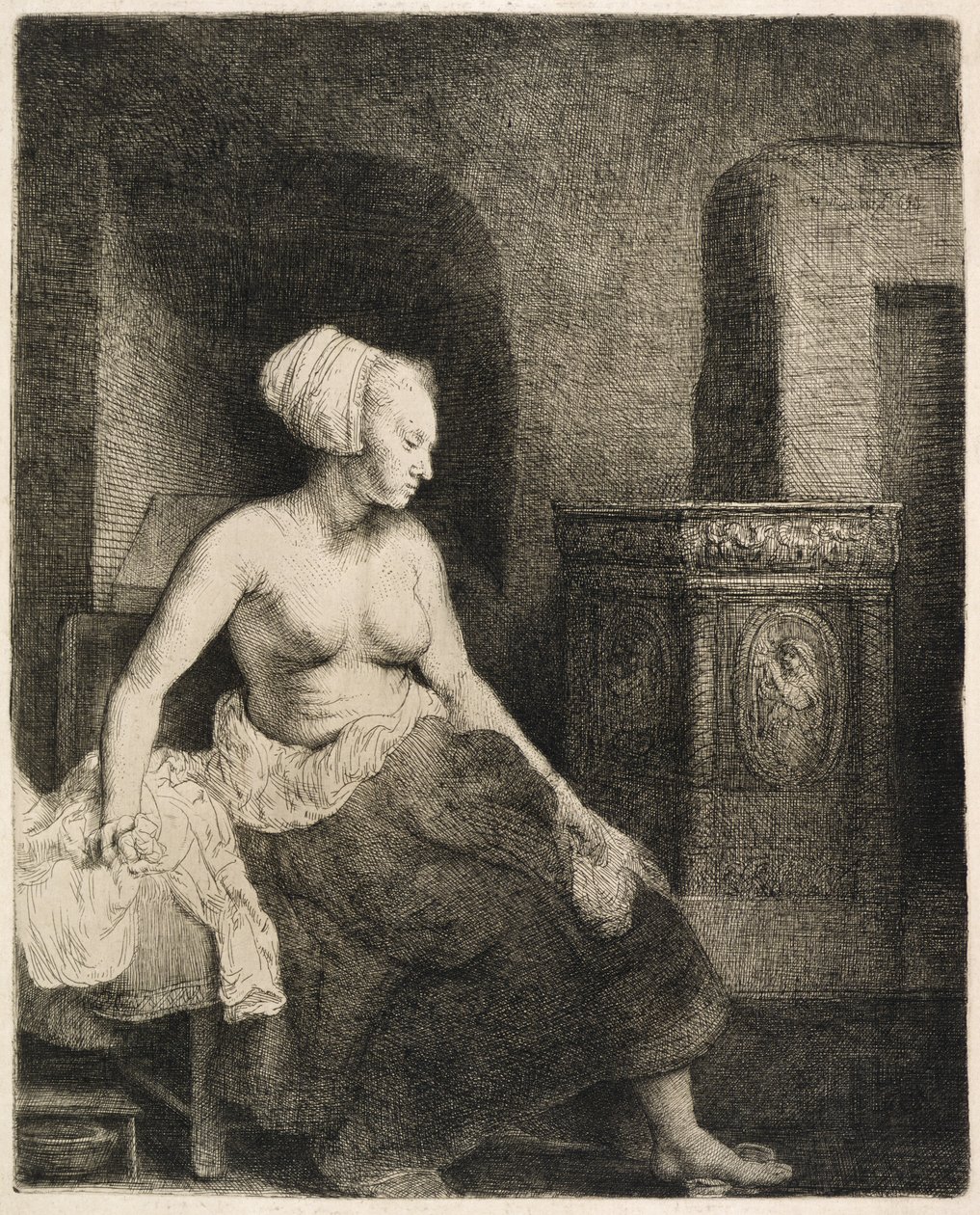 Nainen istuu puolipukeutuneena lieden vieressä, 1658 tekijältä Rembrandt van Rijn