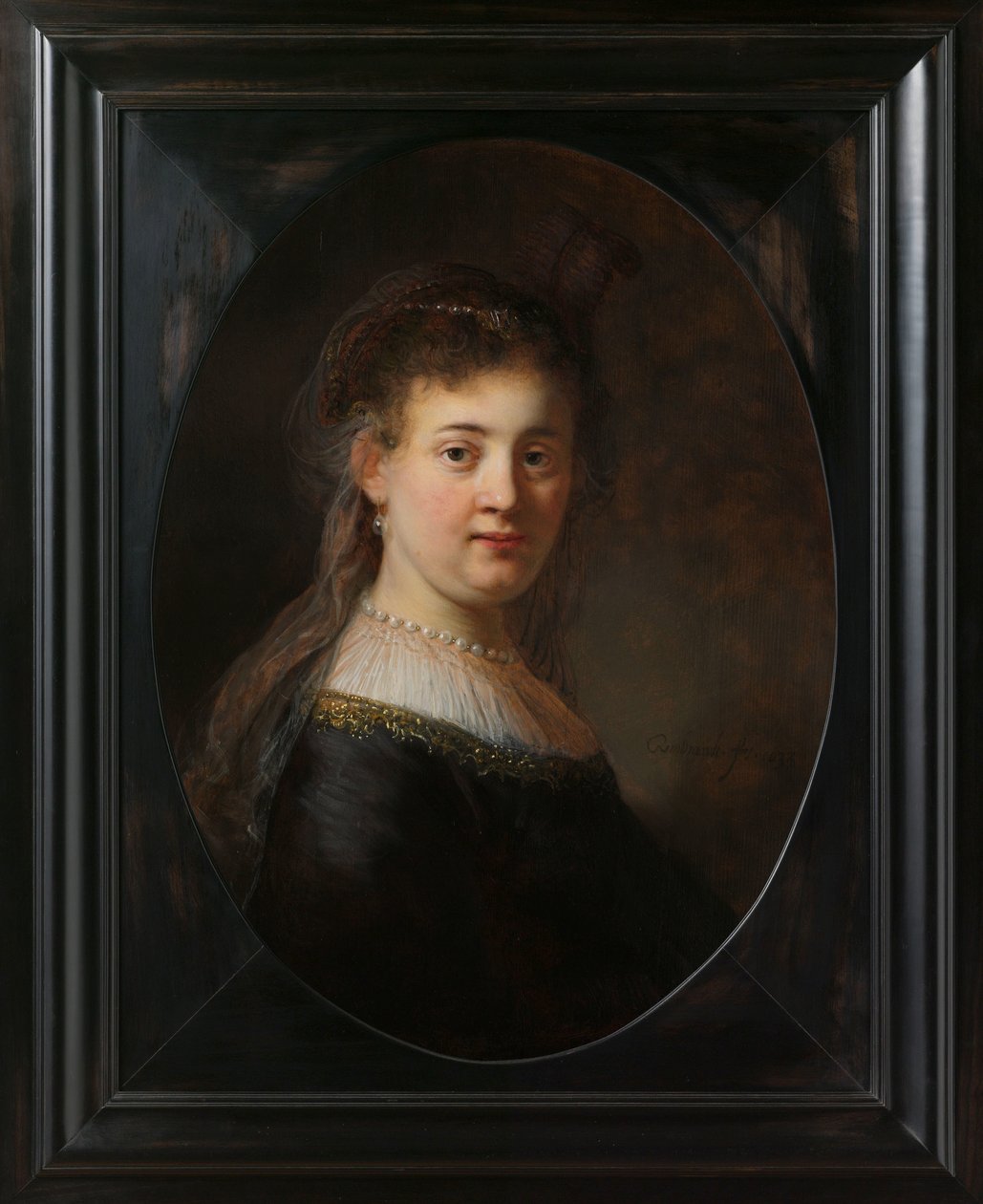 Nuori nainen fantasiaasussa tekijältä Rembrandt van Rijn