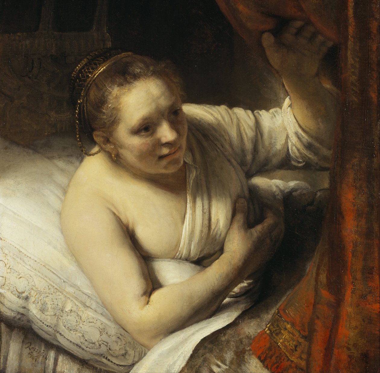 Nainen sängyssä tekijältä Rembrandt van Rijn