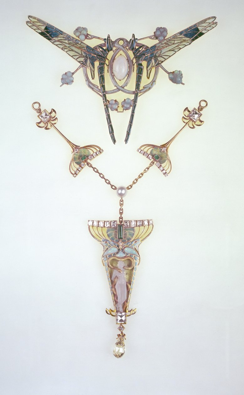 Laliquen hiuskoriste ja Philippe Wolfersin (1858-1929) riipus. tekijältä Rene Jules Lalique