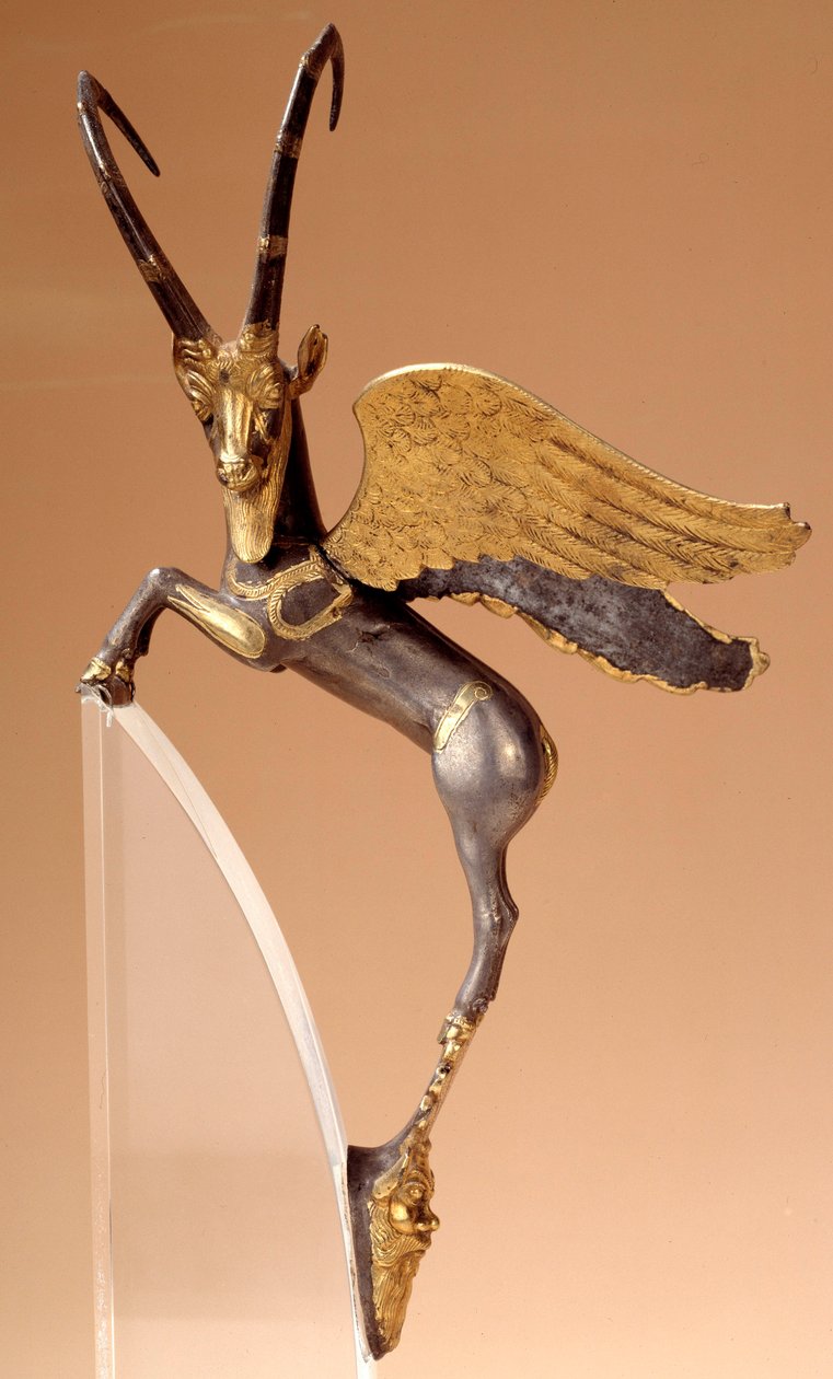 Laitteen kahva: hopea siipivuori, upotekoriste, kulta. Persian kauden routenide (6.-4. vuosisata eKr.), tulee Iranista. Paris, musee du Louvre - Seremoniallinen kahva: siivekäs metsikuuri hopeaa, upotekoristeinen, kulta. Achaemenid-persialainen kausi (6.-4 tekijältä School Persian