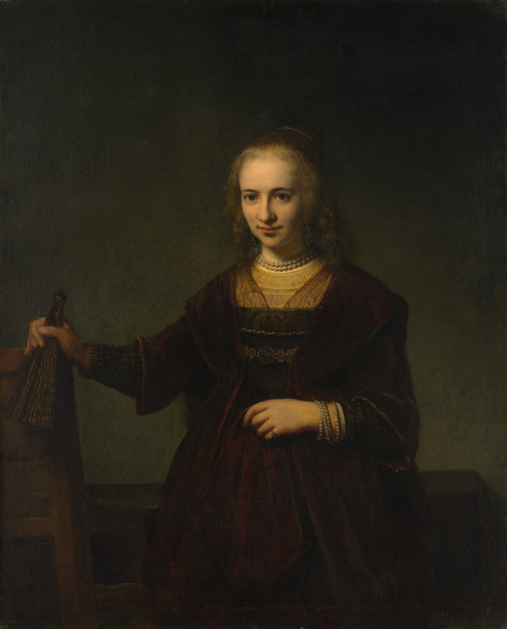 Naisen muotokuva. tekijältä Style of Rembrandt