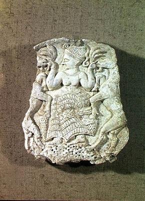 Pyxin kansi, joka esittää Eläinten rakastajatarin ruokkimassa kahta villivuohetta, n. 1200-1150 tekijältä Syrian Syrian